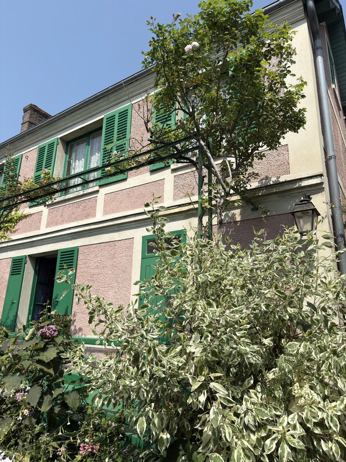 Claude Monet's green-shuttered house at Giverny, France, photographed by Lee Hnetinka
