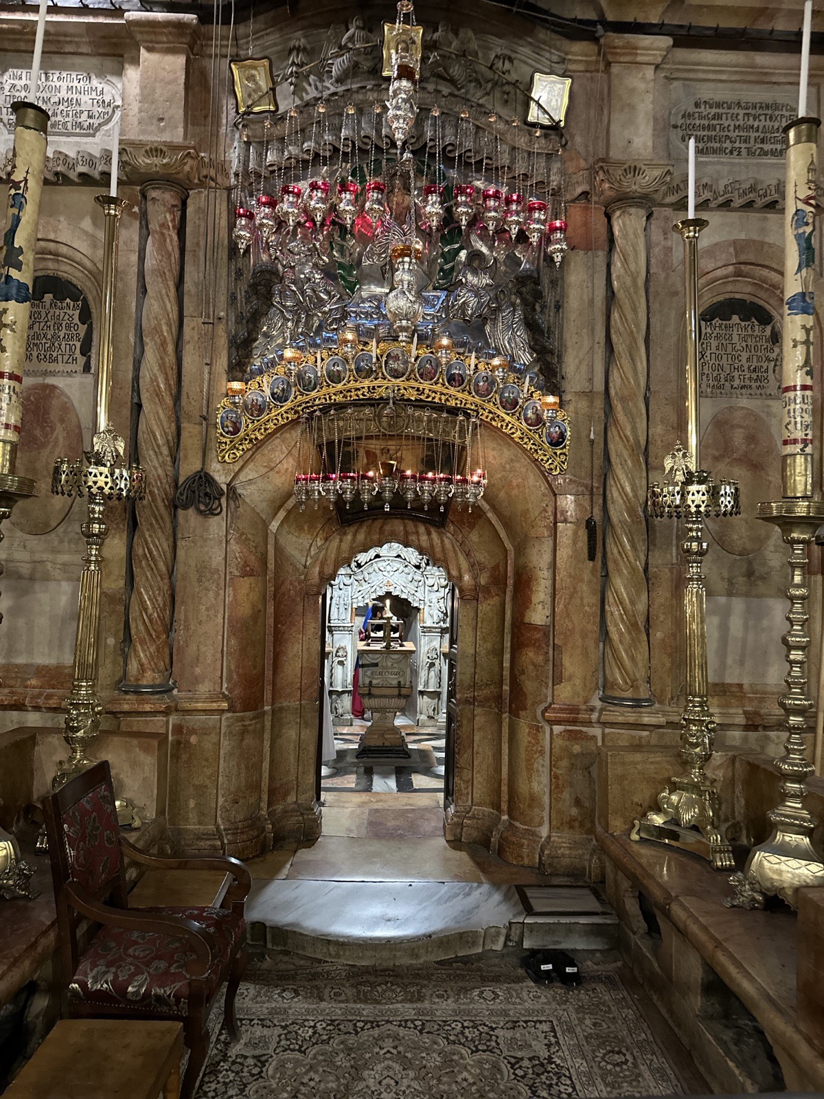 The entrance to the Aedicule, the shrine enclosing the Tomb of Jesus, in the Church of the Holy Sepulchre, Jerusalem, photographed by Lee Hnetinka