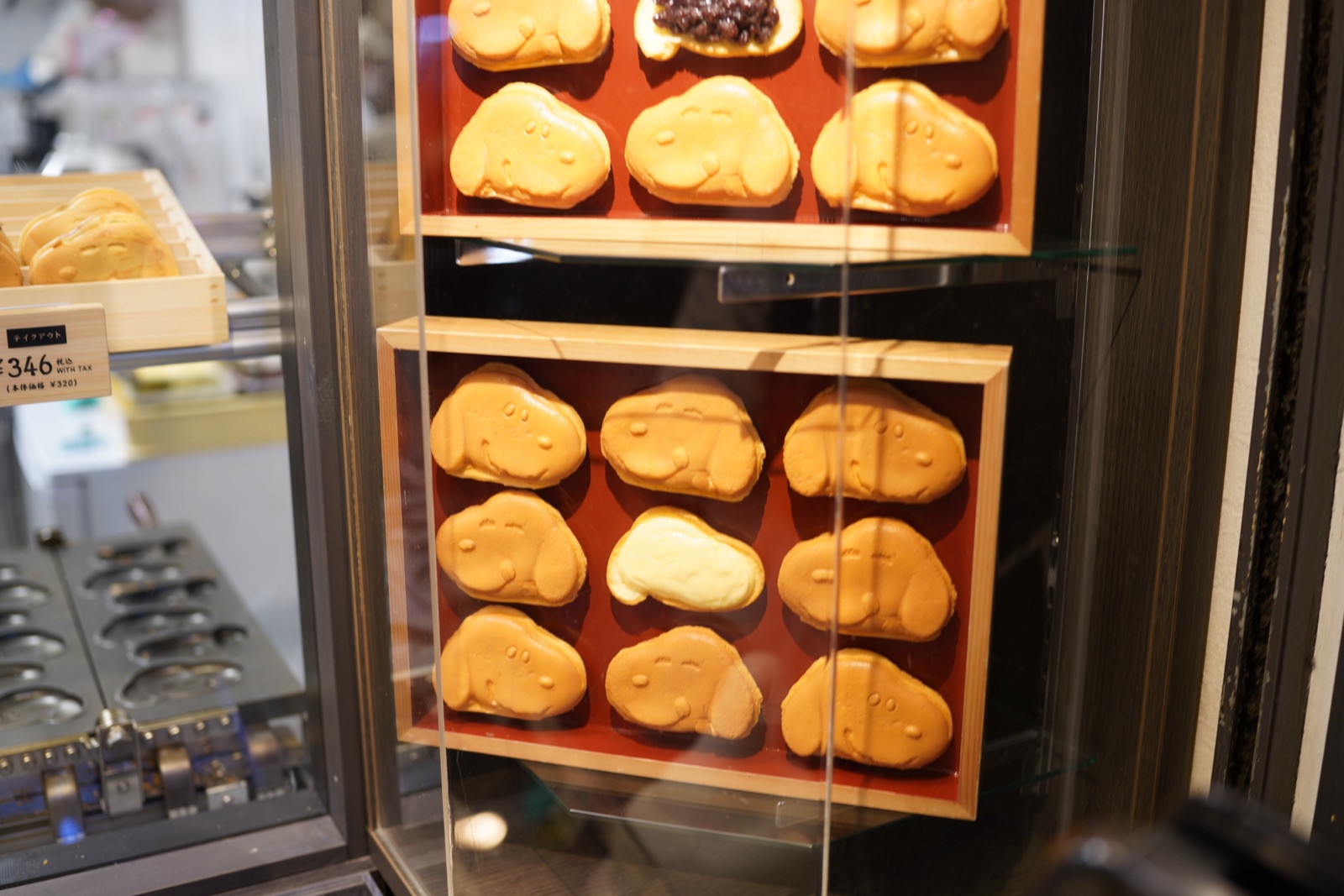 Fresh pastries in a Kyoto bakery case, photographed by Lee Hnetinka