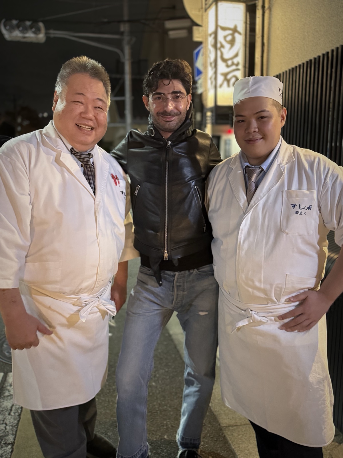 Lee Hnetinka with head chef Toshiya Onishi and his son at Sushiiwa in Kyoto, Japan, 2024