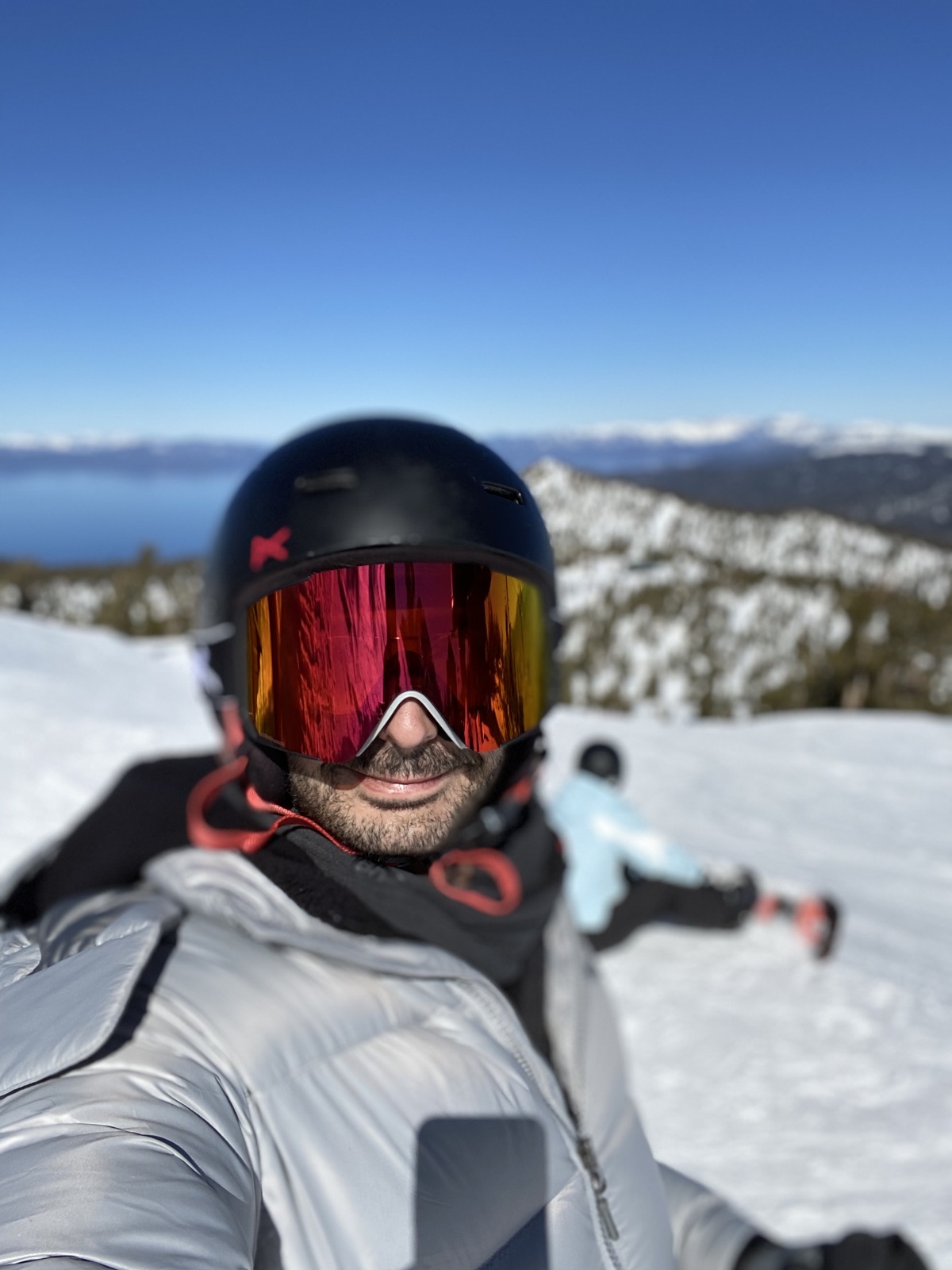 Lee Hnetinka skiing above Lake Tahoe, California